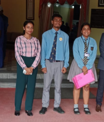 Students and adults together at a school or formal visit in Ranchi